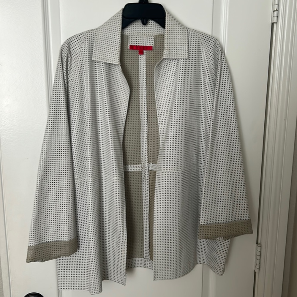 Soft white perforated jacket by shamals